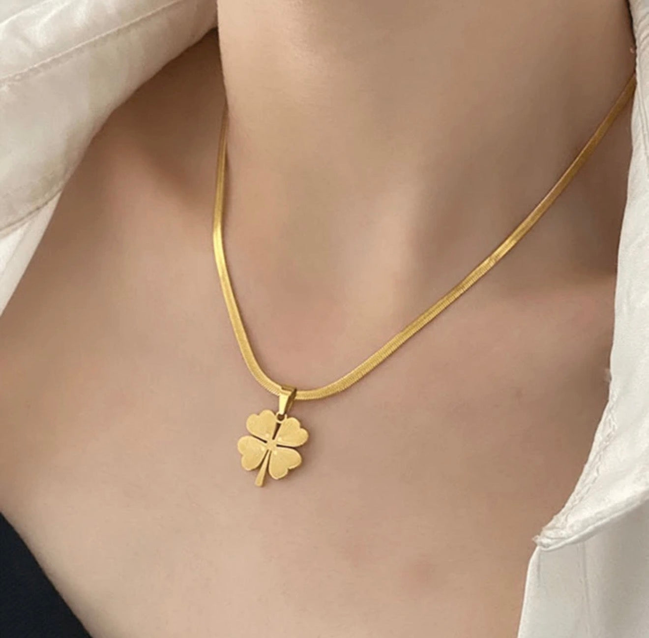 Stainless Steel Necklace With Yellow Four Leaf Clover Pendant