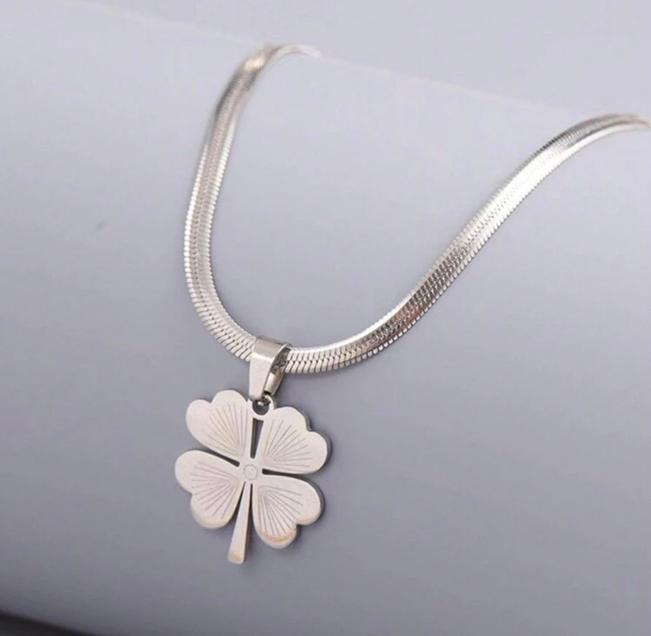 Stainless Steel Necklace With Yellow Four Leaf Clover Pendant