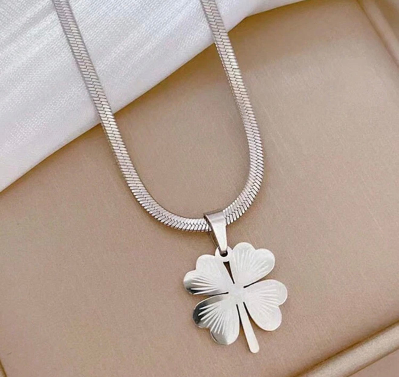 Stainless Steel Necklace With Yellow Four Leaf Clover Pendant