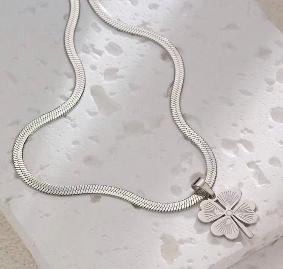 Stainless Steel Necklace With Yellow Four Leaf Clover Pendant